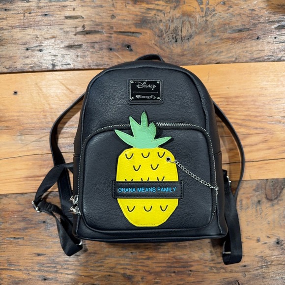 Loungefly Handbags - Loungefly Disney Lilo & Stitch Pineapple Ohana Means Family Mini Backpack Black